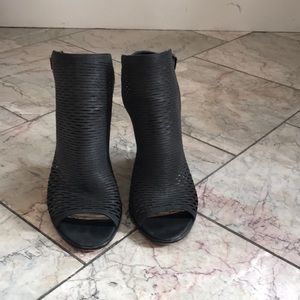 Black Vince Camuto Laser Cut Stacked Heel Booties